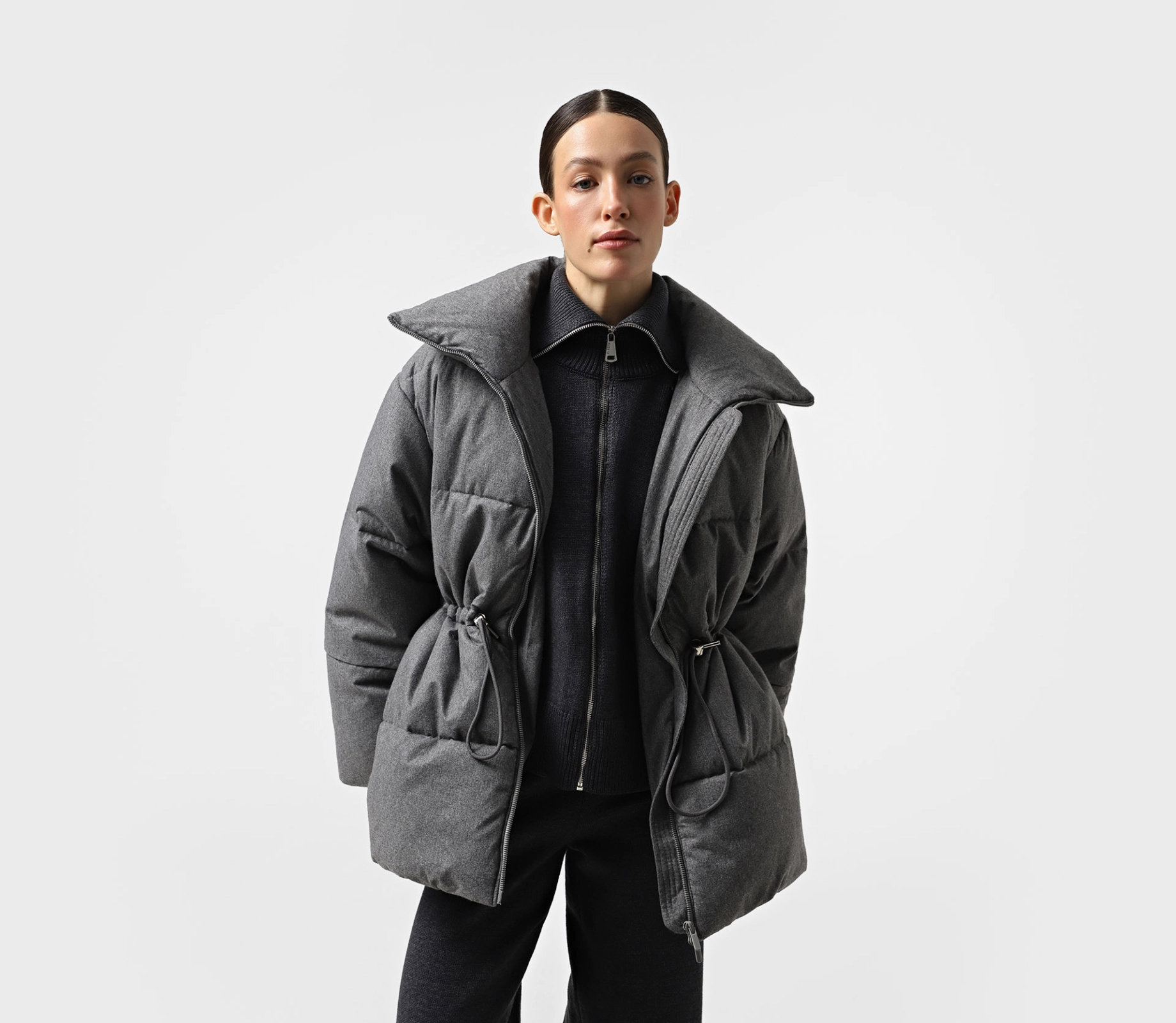 Пуховик середньої довжини з кулісою сірий ціна