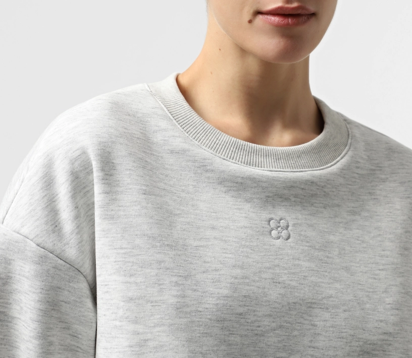 Костюм утеплений з лого світло-сірий меланж фото