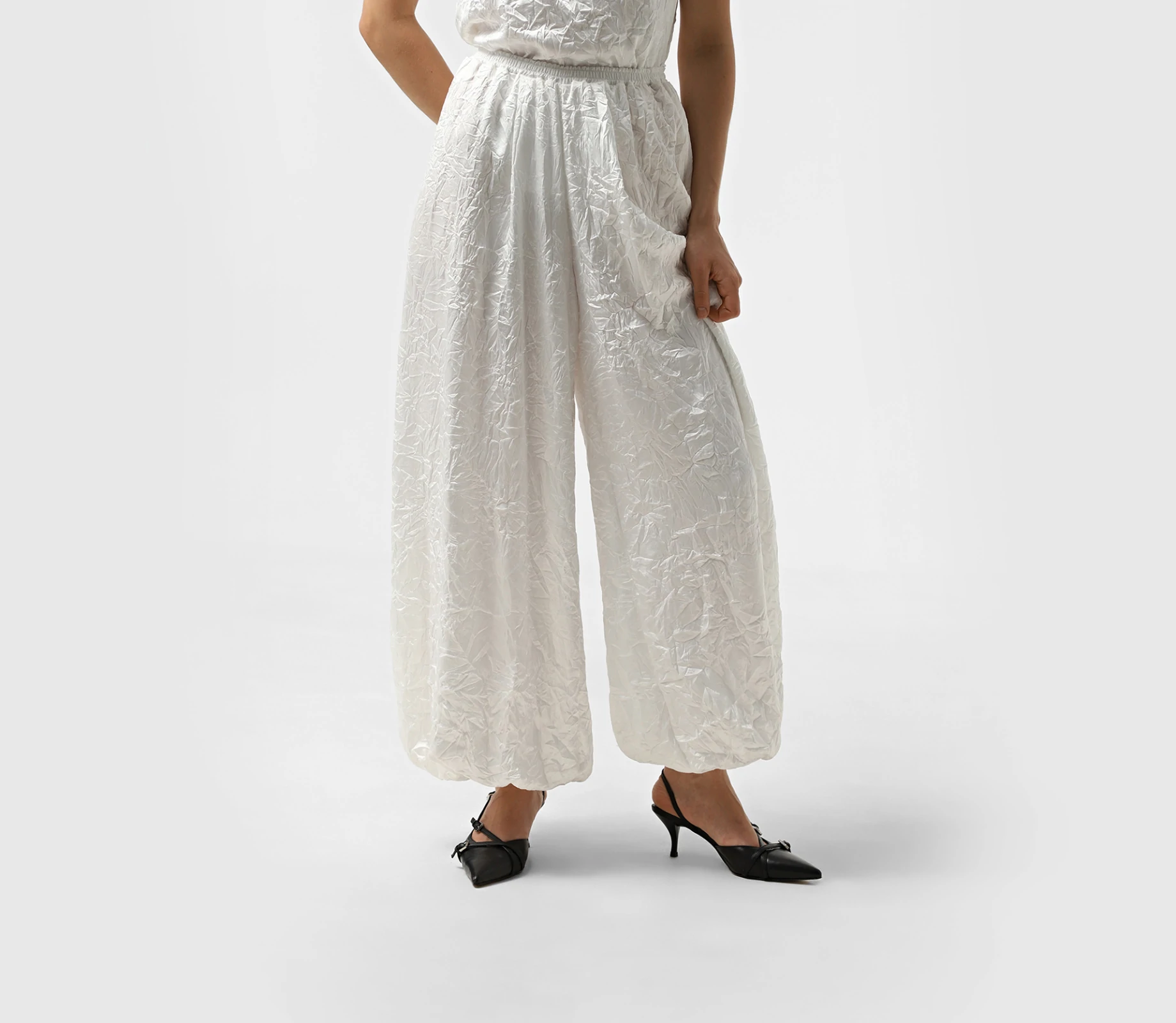 Штани широкі з резинкою понизу молочний замовити