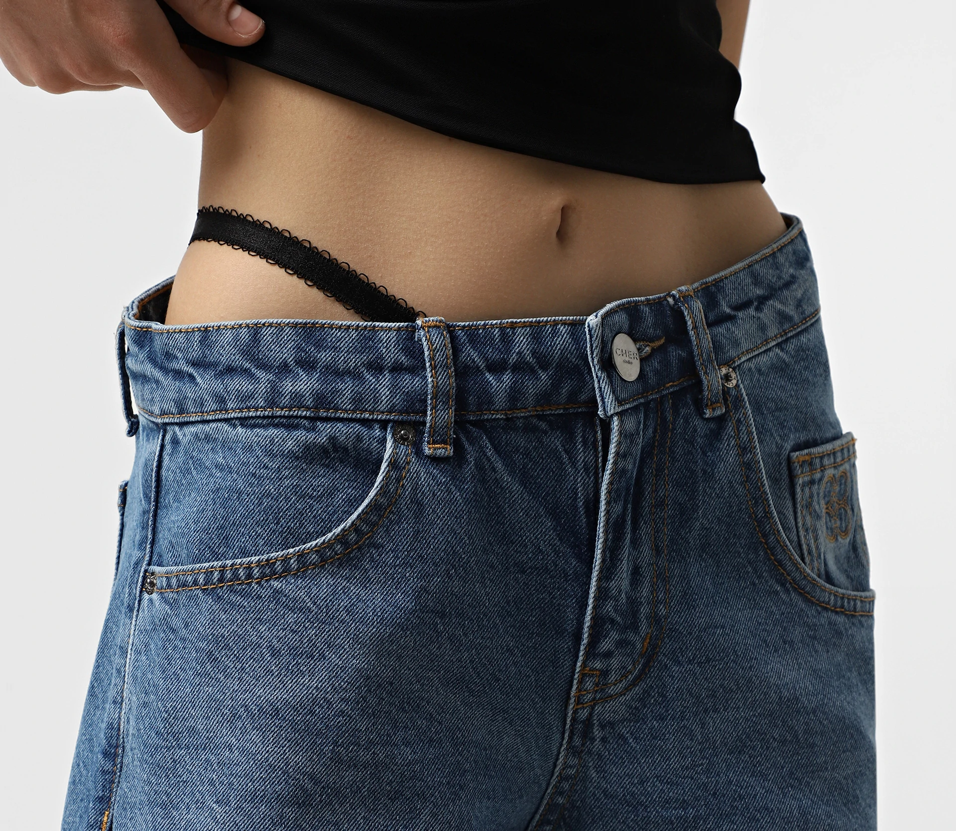 Джинси з асиметричним поясом світло-синій - фото №3 Джинси з асиметричним поясом світло-синій недорого